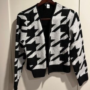 H&M cardigan, fun pattern, black and white size small runs oversized